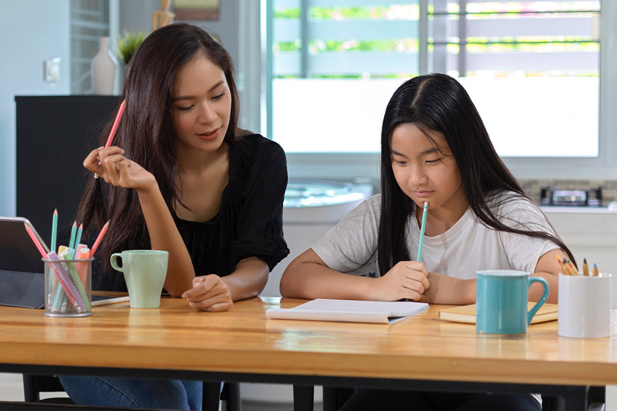 student and tutor together at a desk in San Francisco